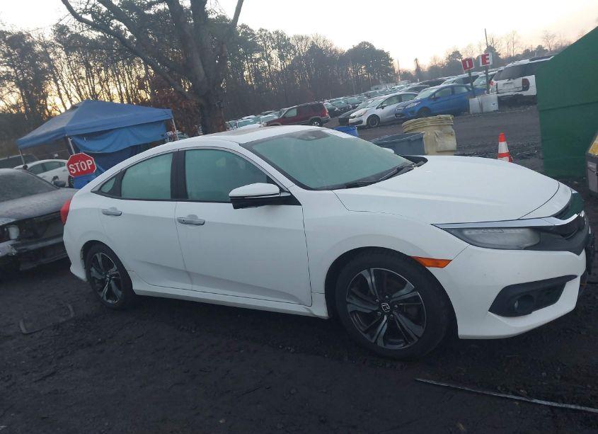 Photo 13 of 2017 Honda Civic TOURING (VIN 2HGFC1F94HH637124)