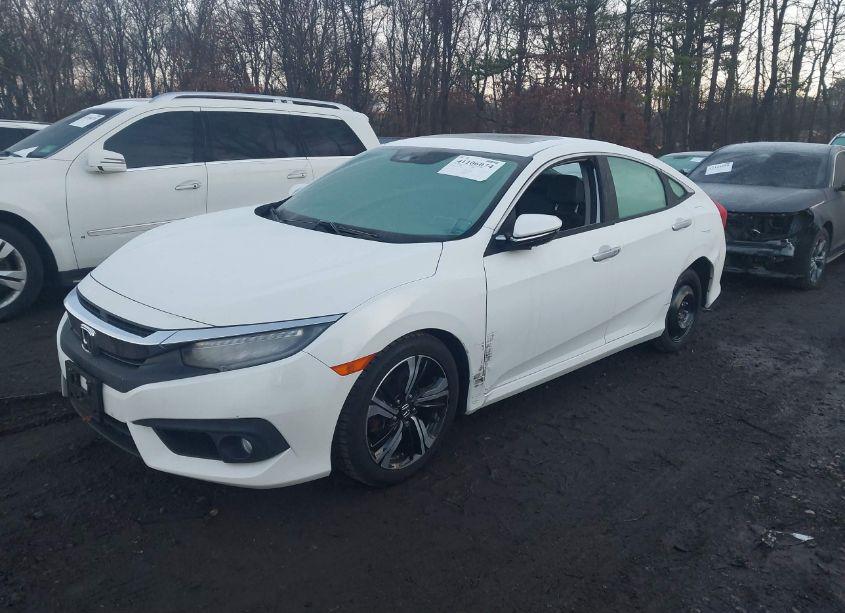 Photo 2 of 2017 Honda Civic TOURING (VIN 2HGFC1F94HH637124)