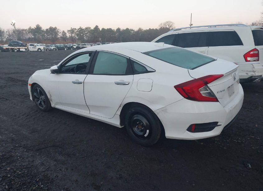 Photo 3 of 2017 Honda Civic TOURING (VIN 2HGFC1F94HH637124)