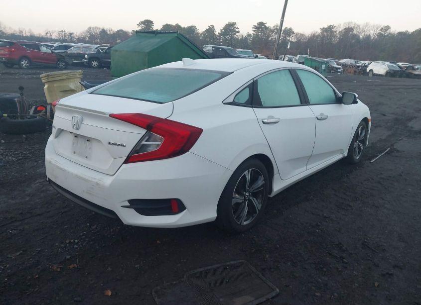 Photo 4 of 2017 Honda Civic TOURING (VIN 2HGFC1F94HH637124)