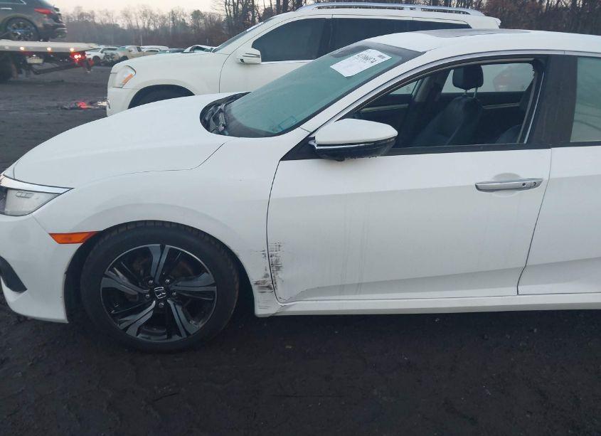 Photo 6 of 2017 Honda Civic TOURING (VIN 2HGFC1F94HH637124)