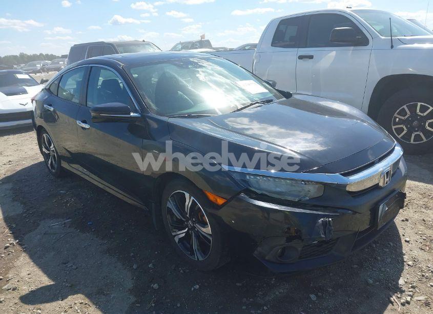 2016 Honda Civic TOURING (VIN 2HGFC1F95GH631234) main photo