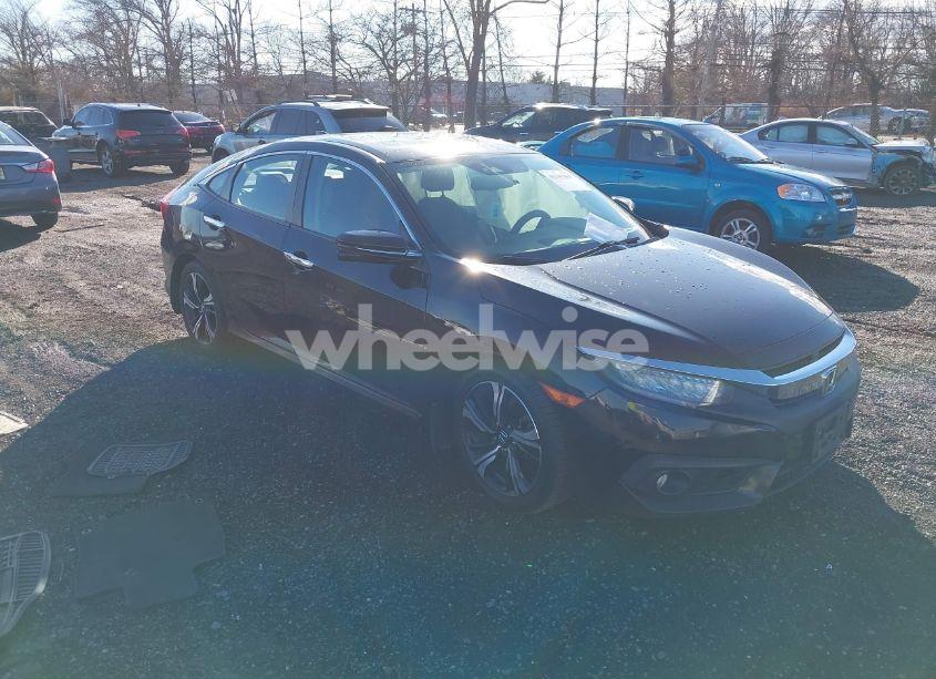 2017 Honda Civic TOURING (VIN 2HGFC1F95HH638024) main photo