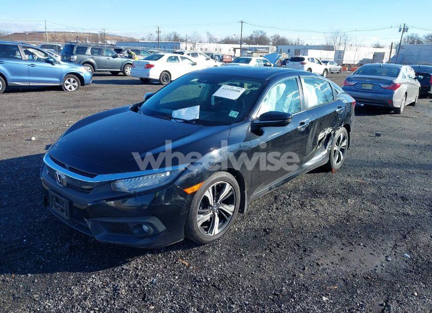 Photo 2 of 2017 Honda Civic TOURING (VIN 2HGFC1F95HH638024)
