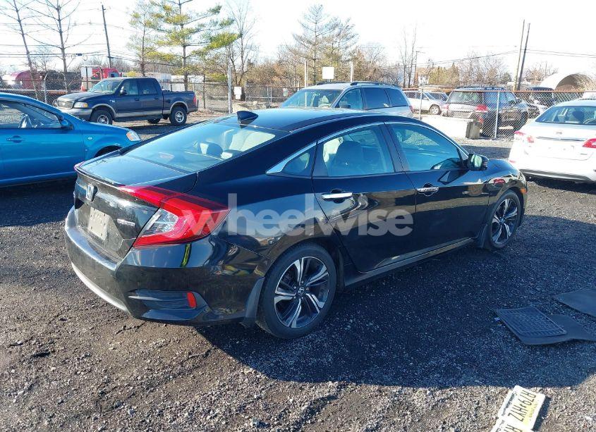 Photo 4 of 2017 Honda Civic TOURING (VIN 2HGFC1F95HH638024)
