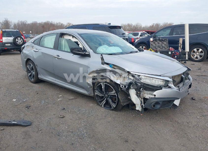 2017 Honda Civic TOURING (VIN 2HGFC1F95HH638797) main photo