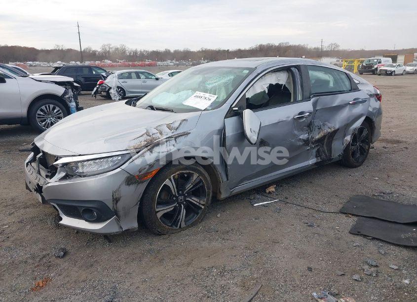 Photo 2 of 2017 Honda Civic TOURING (VIN 2HGFC1F95HH638797)