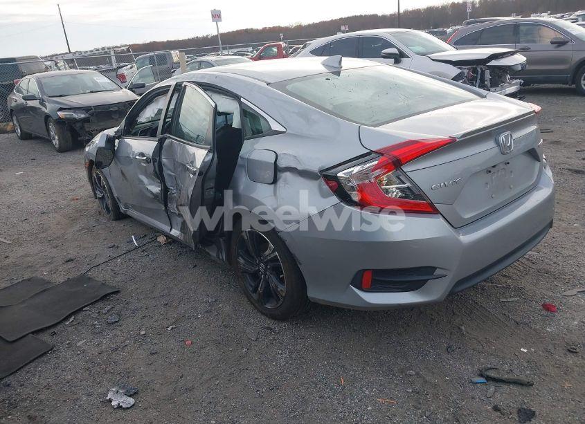 Photo 3 of 2017 Honda Civic TOURING (VIN 2HGFC1F95HH638797)