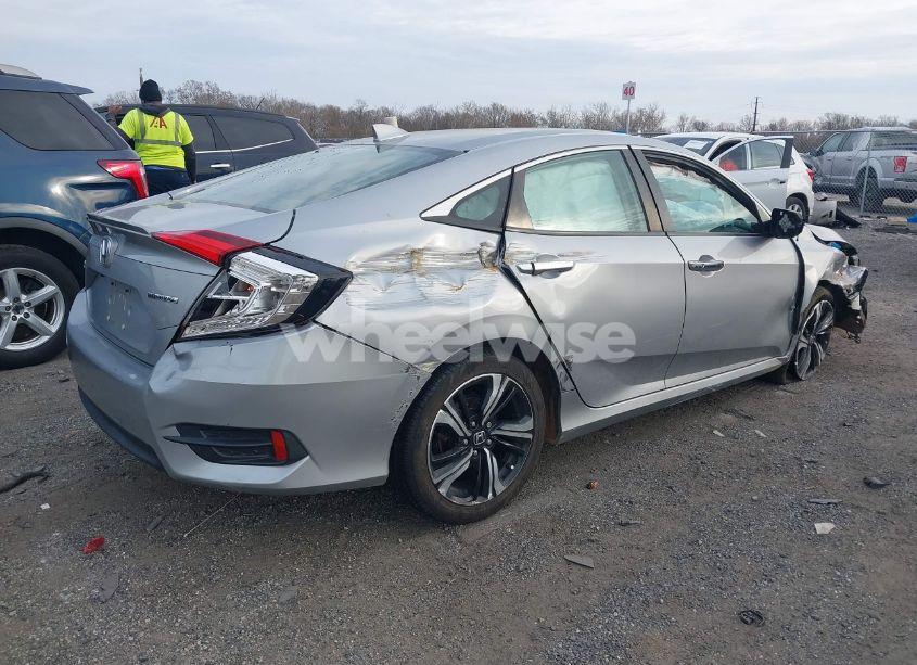 Photo 4 of 2017 Honda Civic TOURING (VIN 2HGFC1F95HH638797)