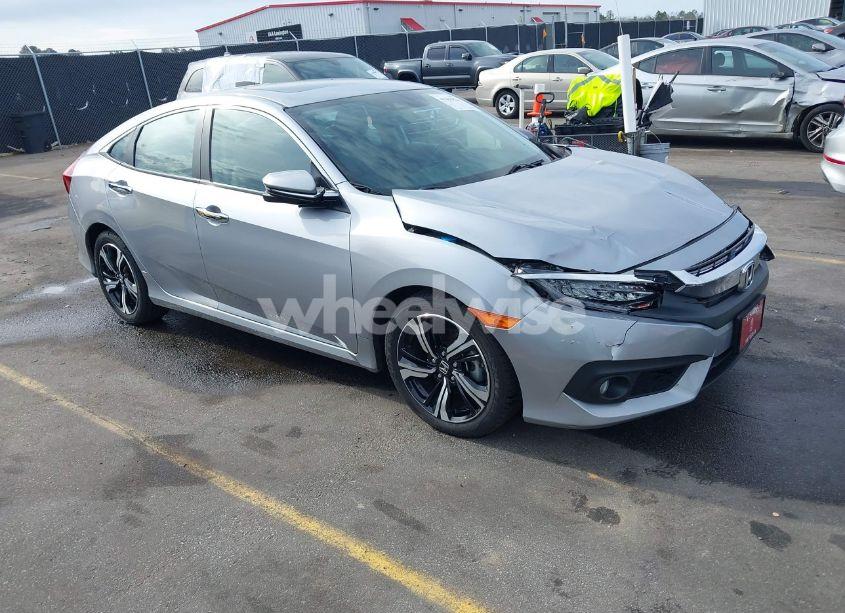 2017 Honda Civic TOURING (VIN 2HGFC1F95HH638816) main photo