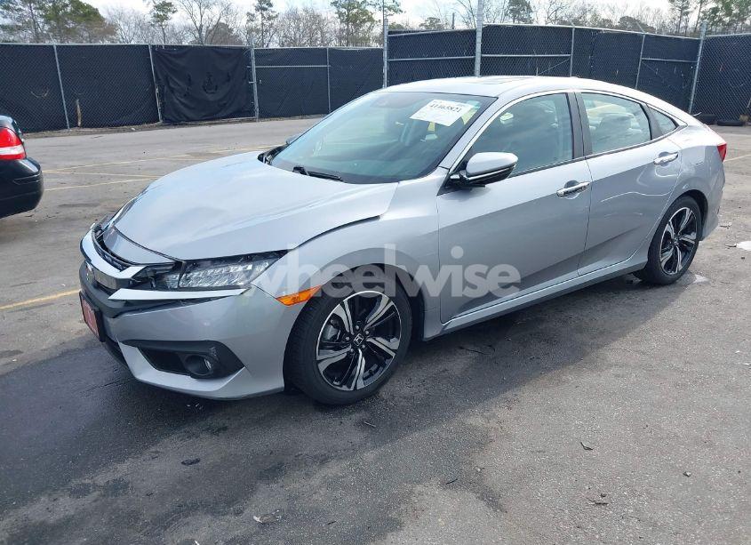 Photo 2 of 2017 Honda Civic TOURING (VIN 2HGFC1F95HH638816)