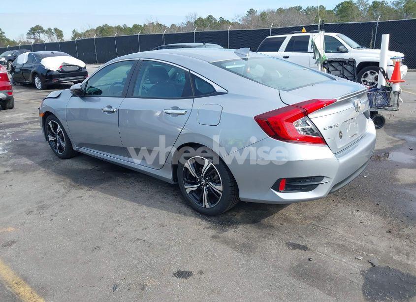 Photo 3 of 2017 Honda Civic TOURING (VIN 2HGFC1F95HH638816)