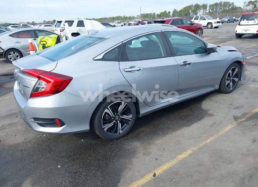 Photo 4 of 2017 Honda Civic TOURING (VIN 2HGFC1F95HH638816)