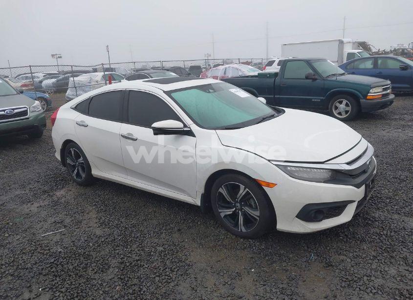 2017 Honda Civic TOURING (VIN 2HGFC1F95HH642316) main photo