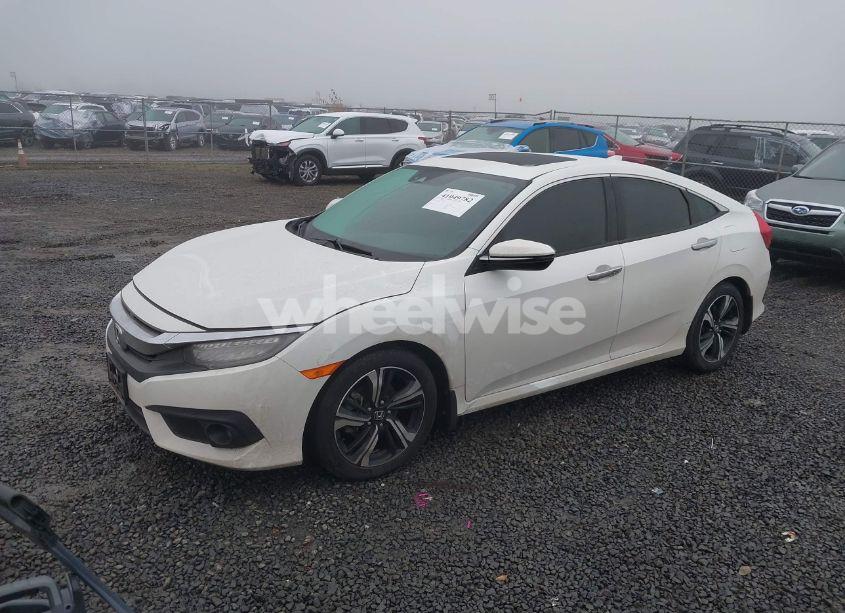Photo 2 of 2017 Honda Civic TOURING (VIN 2HGFC1F95HH642316)