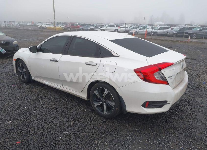 Photo 3 of 2017 Honda Civic TOURING (VIN 2HGFC1F95HH642316)