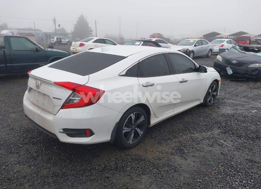 Photo 4 of 2017 Honda Civic TOURING (VIN 2HGFC1F95HH642316)