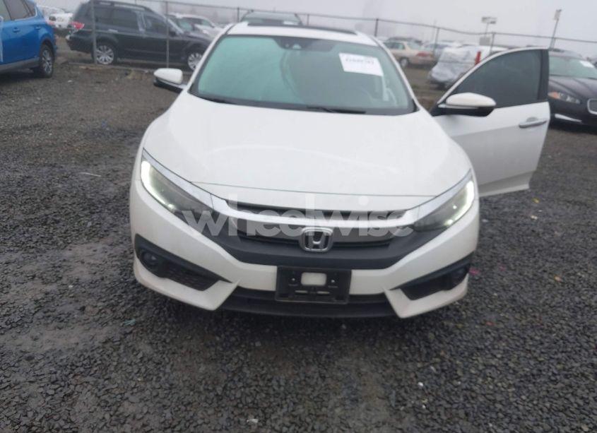 Photo 6 of 2017 Honda Civic TOURING (VIN 2HGFC1F95HH642316)
