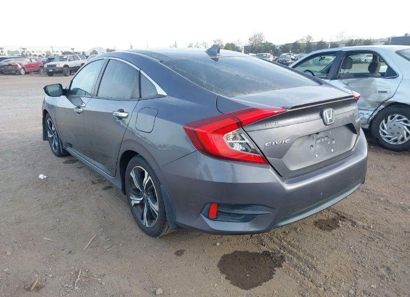 Photo 3 of 2016 Honda Civic TOURING (VIN 2HGFC1F97GH635057)