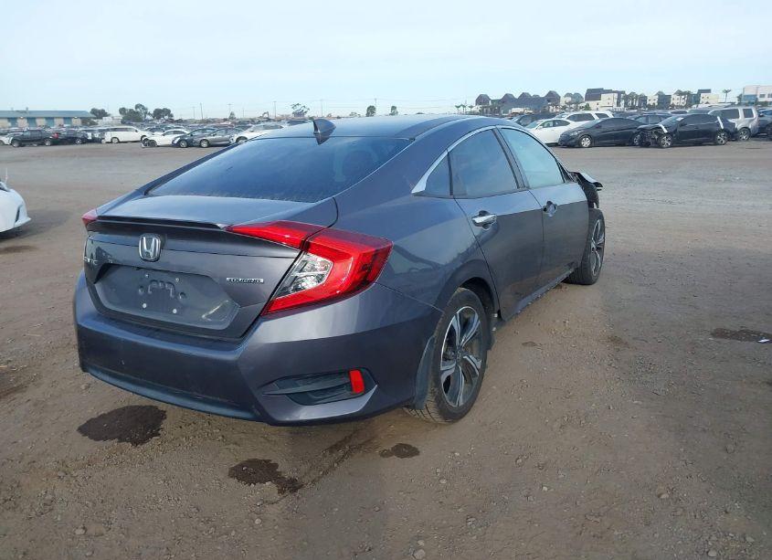 Photo 4 of 2016 Honda Civic TOURING (VIN 2HGFC1F97GH635057)