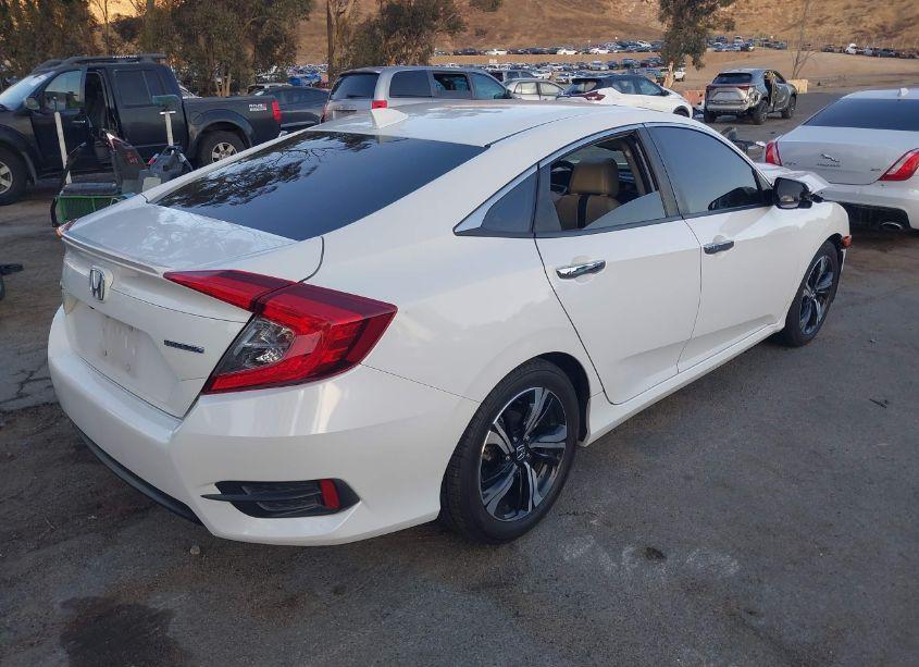 Photo 4 of 2016 Honda Civic TOURING (VIN 2HGFC1F97GH640811)