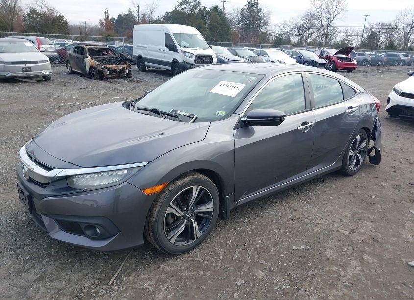 Photo 2 of 2017 Honda Civic TOURING (VIN 2HGFC1F97HH635240)