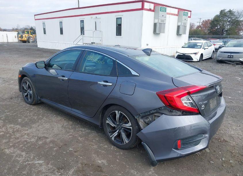 Photo 3 of 2017 Honda Civic TOURING (VIN 2HGFC1F97HH635240)