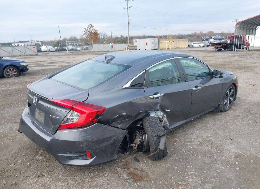 Photo 4 of 2017 Honda Civic TOURING (VIN 2HGFC1F97HH635240)
