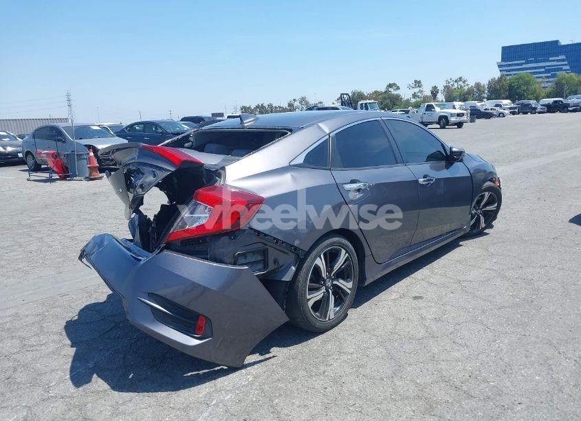 Photo 4 of 2016 Honda Civic TOURING (VIN 2HGFC1F98GH657066)