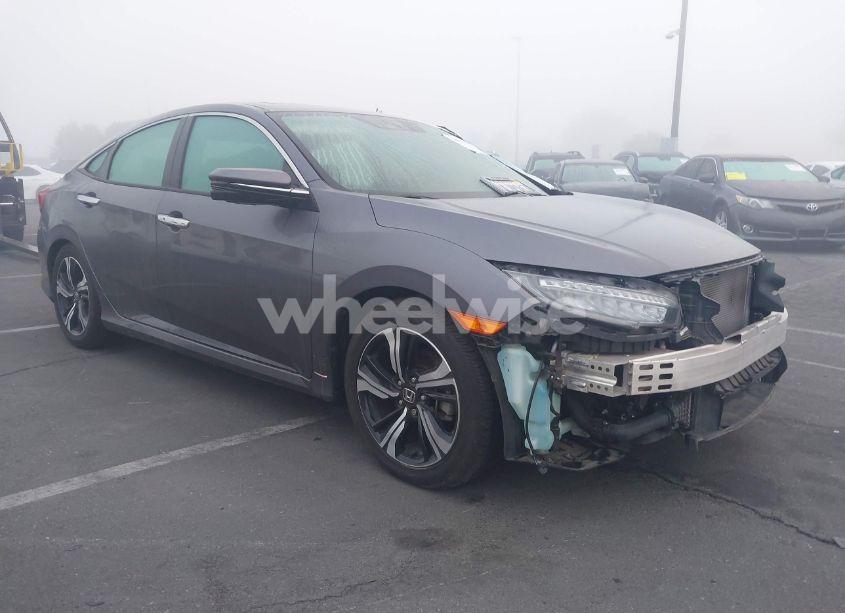 2017 Honda Civic TOURING (VIN 2HGFC1F98HH659062) main photo