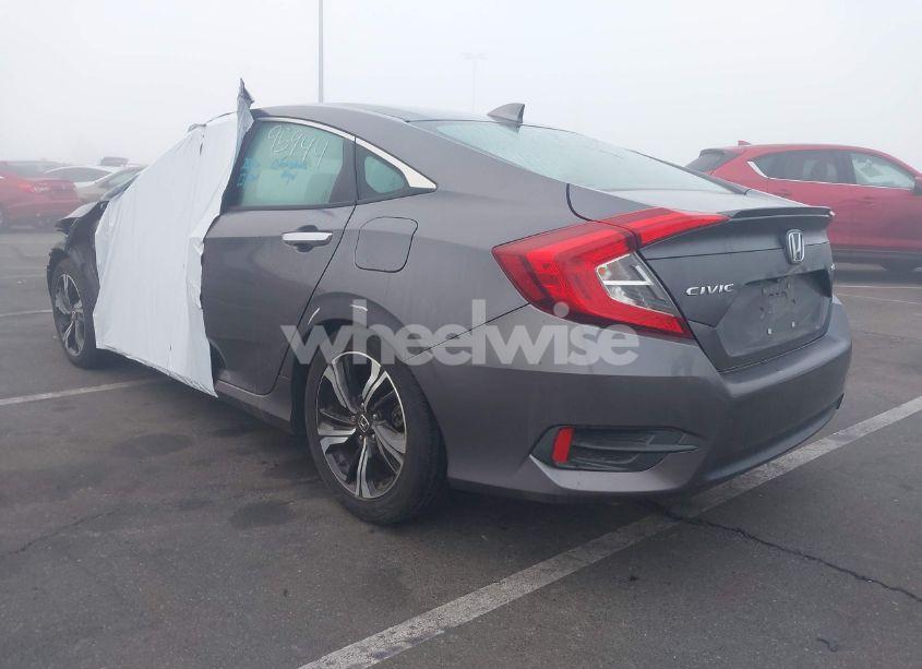 Photo 3 of 2017 Honda Civic TOURING (VIN 2HGFC1F98HH659062)