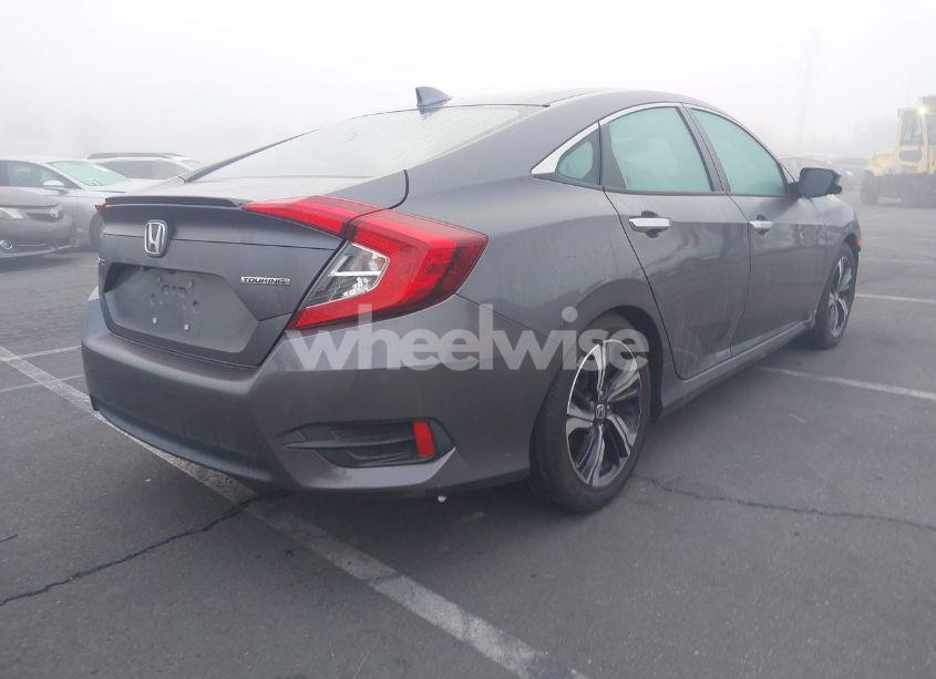 Photo 4 of 2017 Honda Civic TOURING (VIN 2HGFC1F98HH659062)