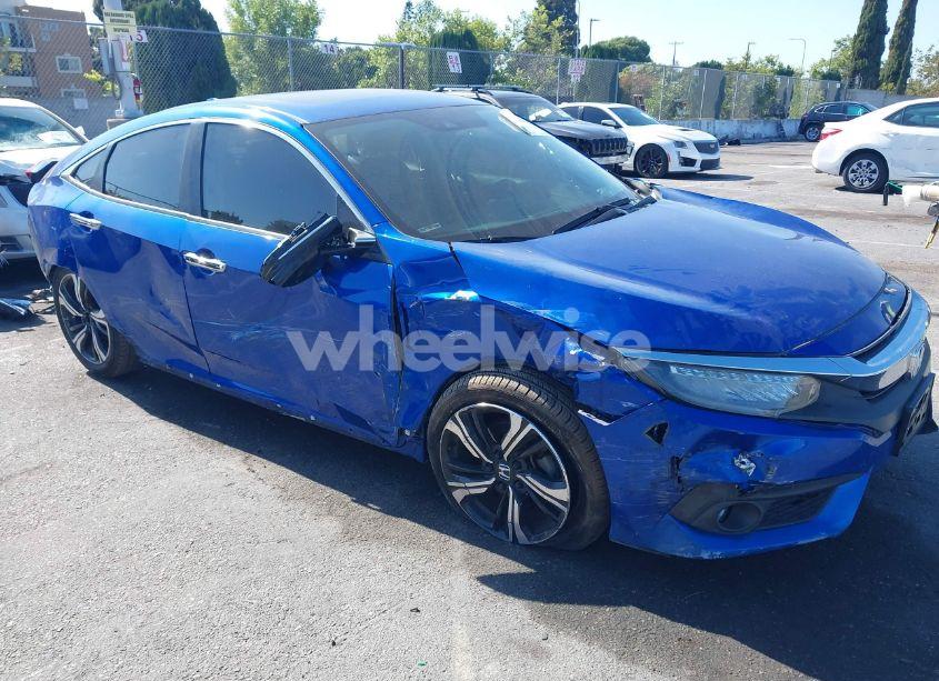 2016 Honda Civic TOURING (VIN 2HGFC1F99GH659117) main photo