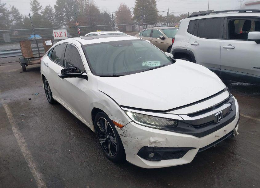 2016 Honda Civic TOURING (VIN 2HGFC1F9XGH644996) main photo