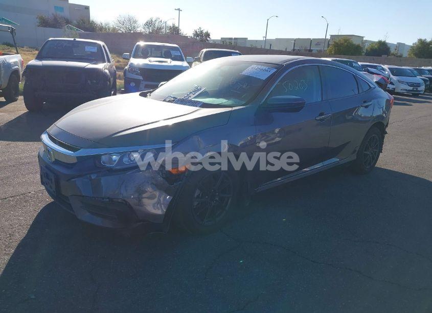 Photo 2 of 2017 Honda Civic LX (VIN 2HGFC2F50HH518084)
