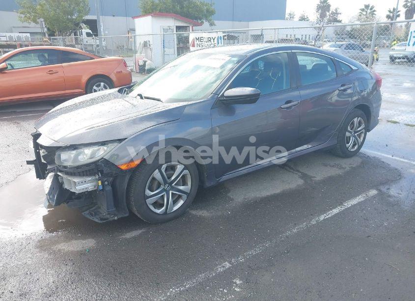 Photo 2 of 2017 Honda Civic LX (VIN 2HGFC2F50HH540361)