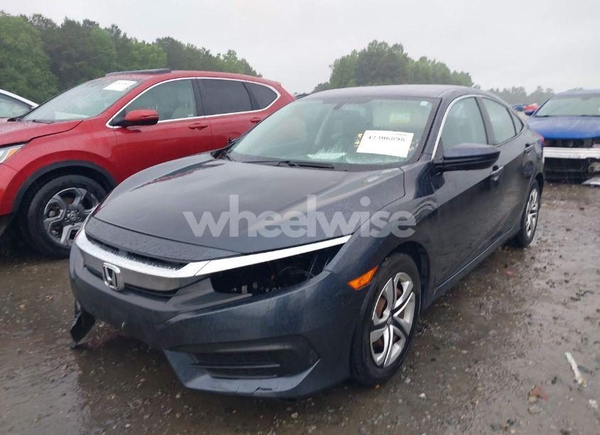 Photo 2 of 2017 Honda Civic LX (VIN 2HGFC2F50HH551957)