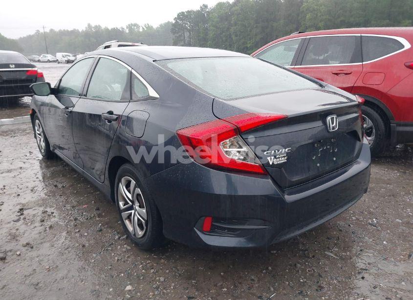 Photo 3 of 2017 Honda Civic LX (VIN 2HGFC2F50HH551957)