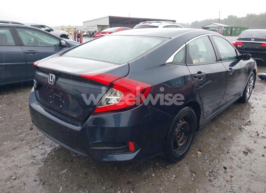 Photo 4 of 2017 Honda Civic LX (VIN 2HGFC2F50HH551957)