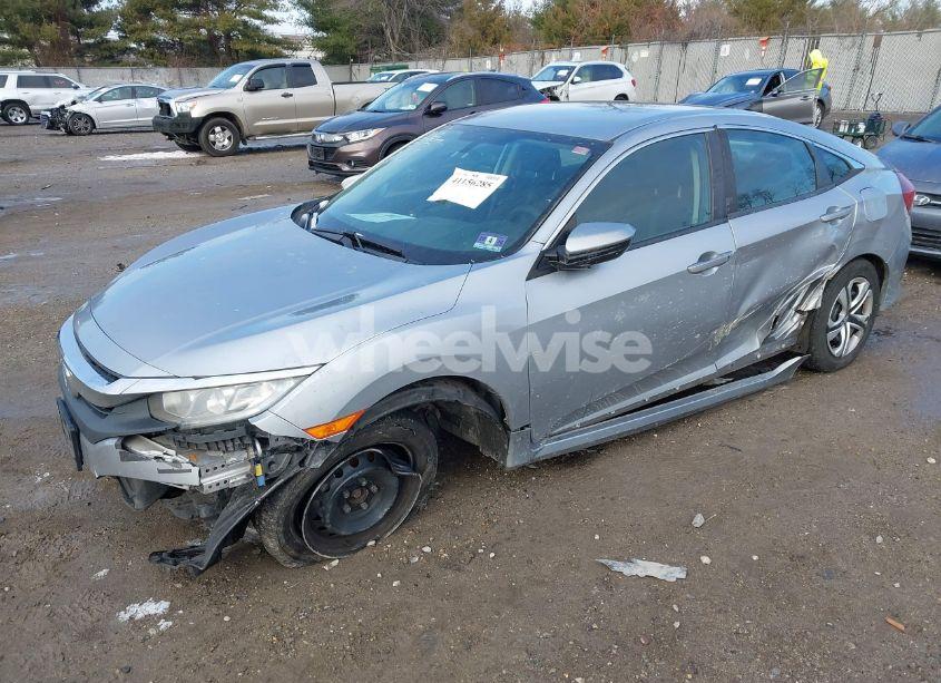 Photo 2 of 2017 Honda Civic LX (VIN 2HGFC2F50HH569018)
