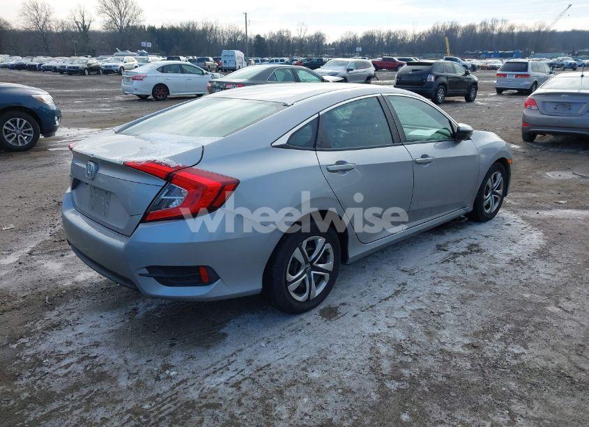 Photo 4 of 2017 Honda Civic LX (VIN 2HGFC2F50HH569018)