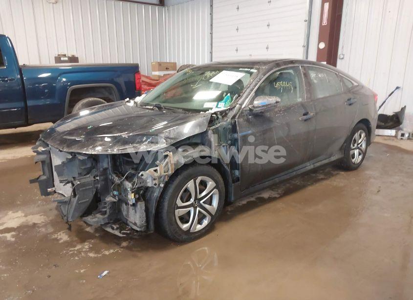 Photo 2 of 2018 Honda Civic LX (VIN 2HGFC2F50JH607286)