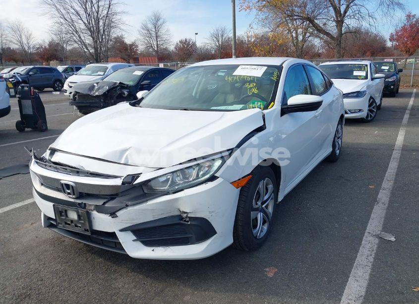 Photo 2 of 2018 Honda Civic LX (VIN 2HGFC2F51JH509609)