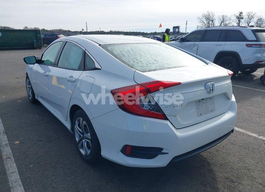 Photo 3 of 2018 Honda Civic LX (VIN 2HGFC2F51JH509609)
