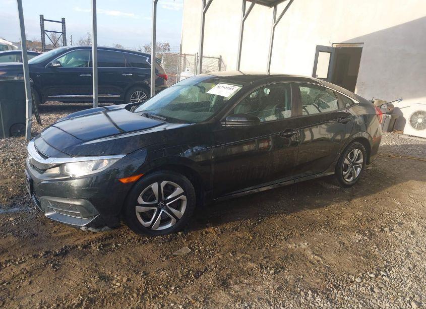 Photo 2 of 2018 Honda Civic LX (VIN 2HGFC2F51JH521615)