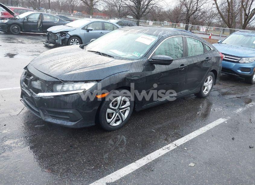 Photo 2 of 2018 Honda Civic LX (VIN 2HGFC2F51JH523901)