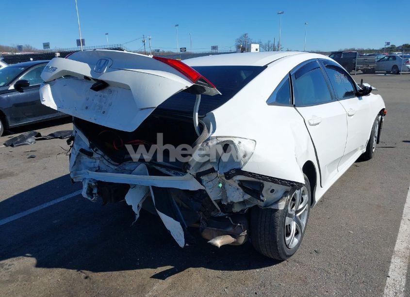 Photo 4 of 2018 Honda Civic LX (VIN 2HGFC2F51JH558003)