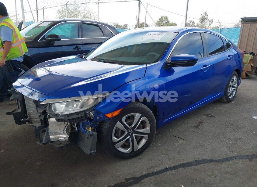 Photo 2 of 2018 Honda Civic LX (VIN 2HGFC2F51JH558860)