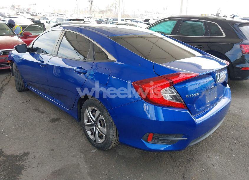 Photo 3 of 2018 Honda Civic LX (VIN 2HGFC2F51JH558860)