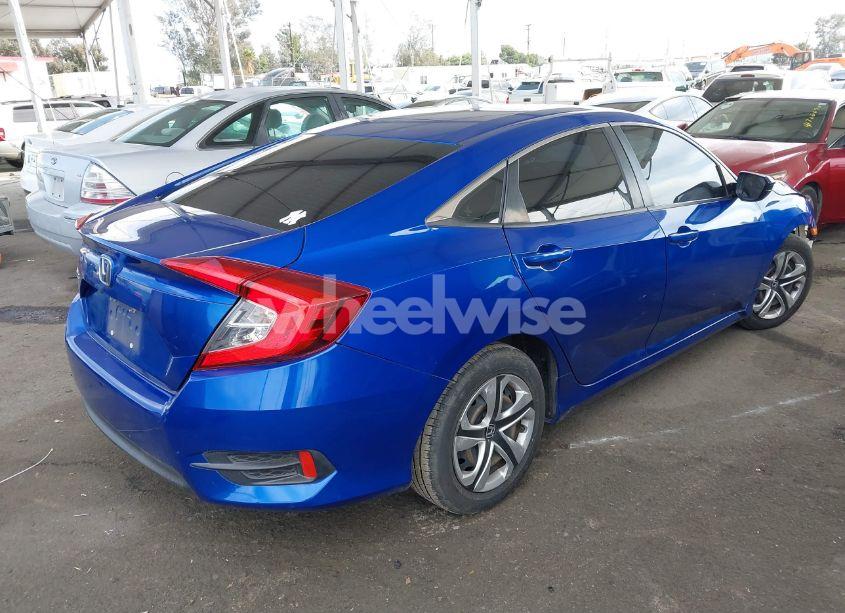 Photo 4 of 2018 Honda Civic LX (VIN 2HGFC2F51JH558860)